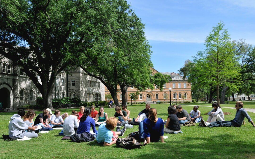 Students take class on the acdemic quad